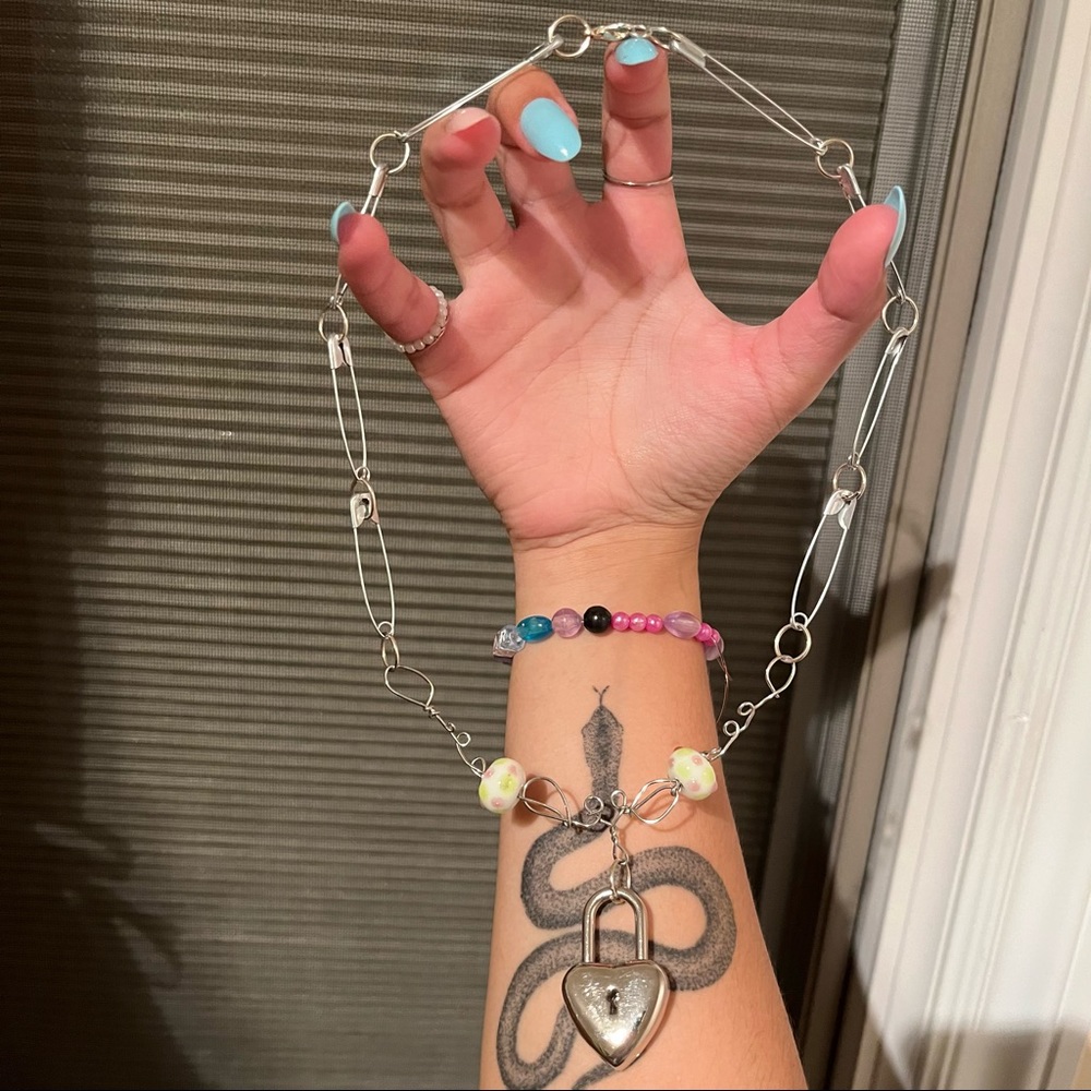 handmade necklace with a heart lock